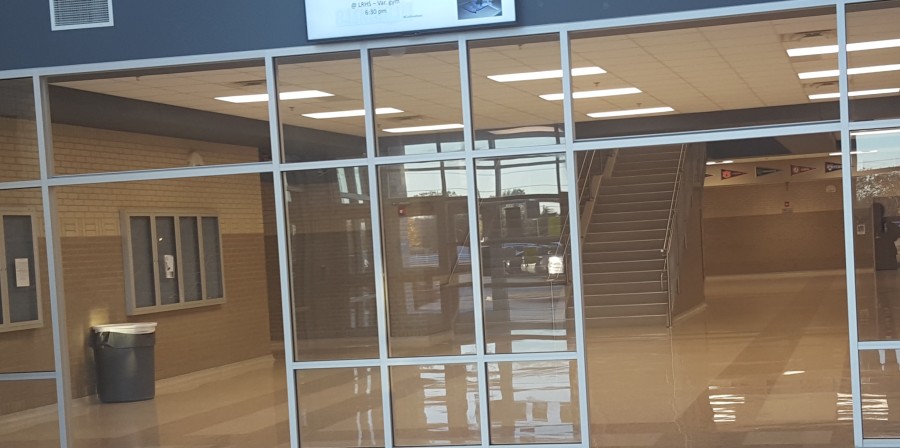 The security doors in the front entrance of Lake Ridge high school.