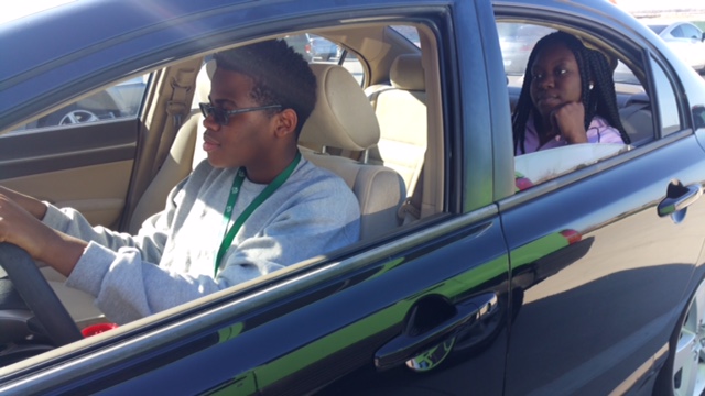 From left, sophomore Jordan Miller and junior Deborah Omoregie, contemplate taking a cruise from the school parking lot, Jan. 25, 2016.