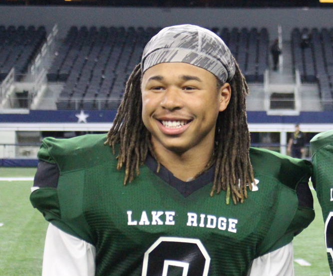 Jett Duffey is all smiles after a playoff win at AT&T Stadium in Arlington.