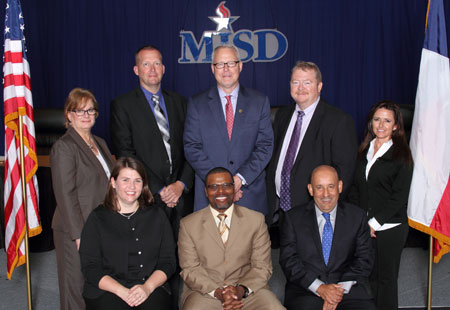 MISD School Board members seated from from left: Karen Marcucci, Dr. Michael Evans and Raul Gonzalez. 
Standing from left: Beth Light, Danny Baas, Dr. Jim Vaszauskas, Terry Moore, and Courtney Lackey Wilson.