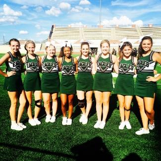 LRHS Cheerleaders pose on the field