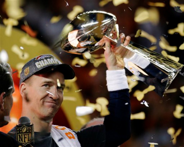 Peyton+Manning+lifts+the+Lombardi+Trophy+after+winning+Super+Bowl+Trophy