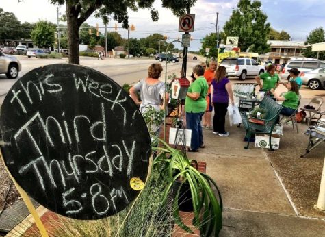 Mansfield Gardening Club talking and visiting with customers.