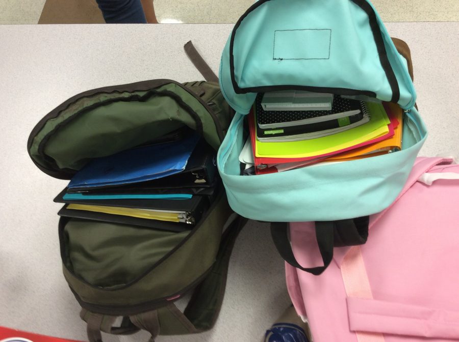 Backpacks with school supplies that belong to students.