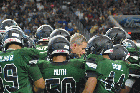 Coach Thor talks to his team.