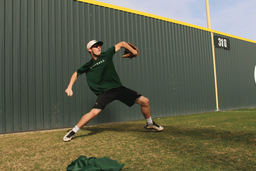 Allen Allrutz warms up during tryouts.