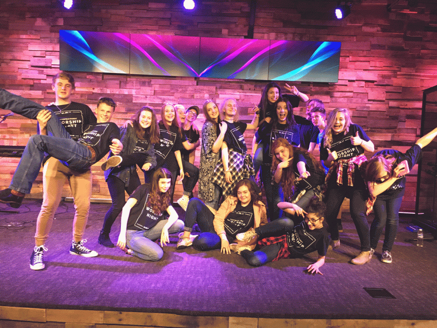 Students pose after a night of worship.