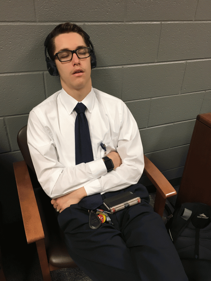 Senior Alex Minor gets in a nap between classes.