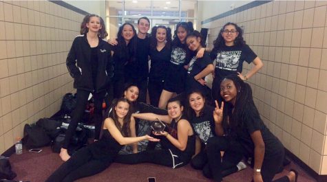 JV Winterguard poses with their trophy