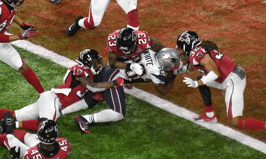 Patriots James White scores the game winning touchdown in overtime.