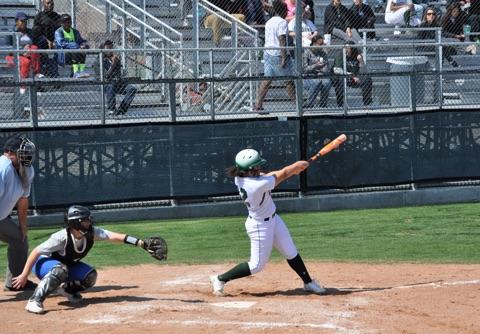 Kylah Marzette swings at the softball game. 