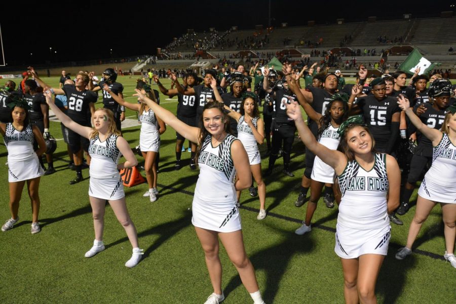 Cheerleaders celebrate after a victory.