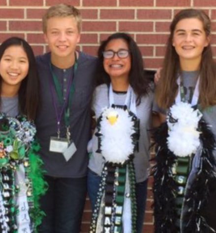 Melanie Perez (third from left) poses with friends for homecoming
