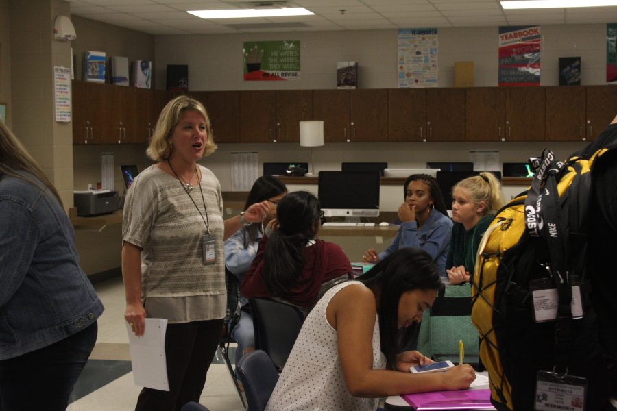 Kristi Canon teaching her Yearbook class, is excited to be at Lake Ridge.