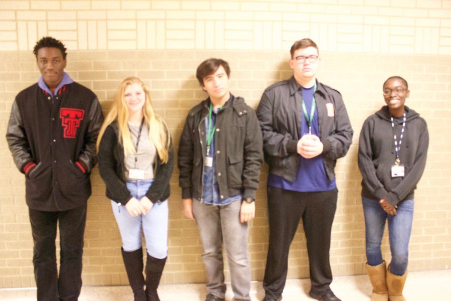 Students pose showing the variety of the student body.