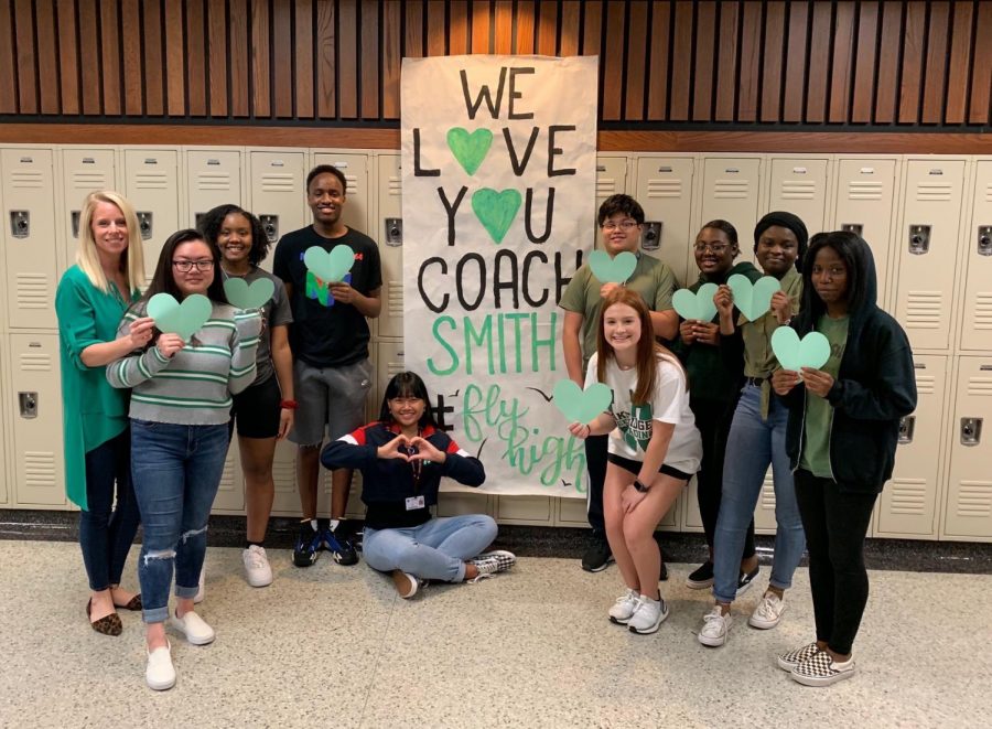 Students and Faculty at Timberview High School wear green to honor Coach Smith.