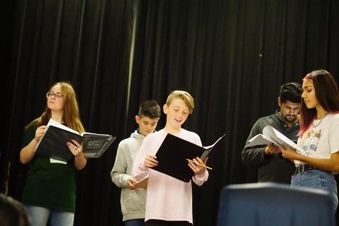 Students recite lines with Theatre teacher Alfredo Tamayo