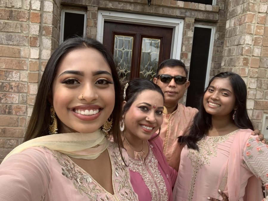 Neva Khan embraces her culture as she celebrates with her family. 