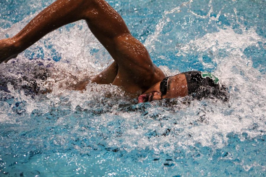 Lake Ridge swimmer working hard in the water at a swim meet. Photo courtesy of Tyler Quisenberry (ENN Staff)
