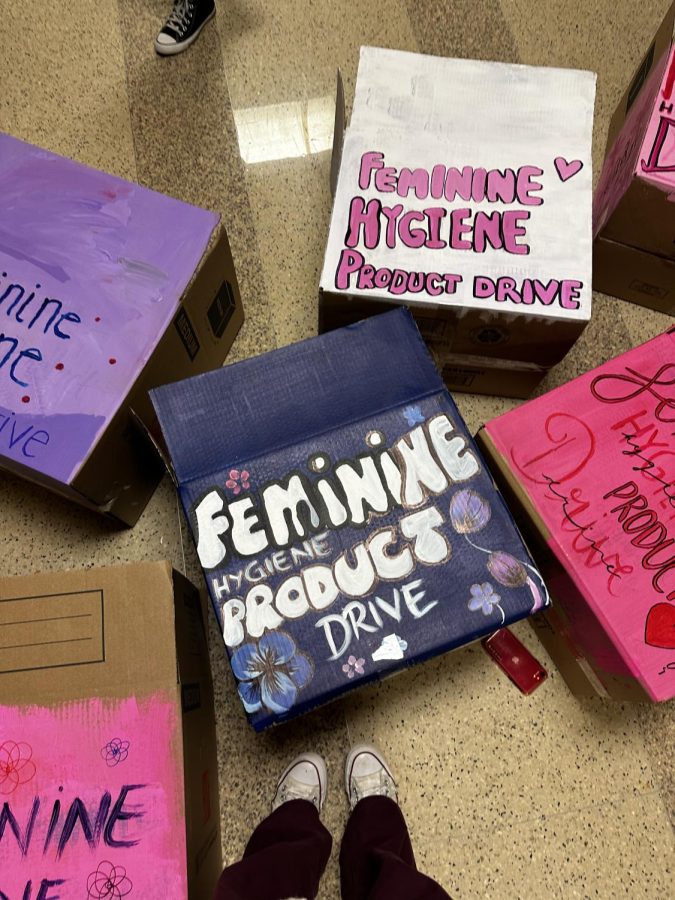 Girl Up decorates boxes for donations